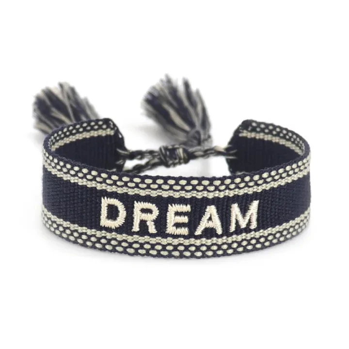 Actual ZM39 26-DREAM woven bracelet catalog photograph with DREAM lettering