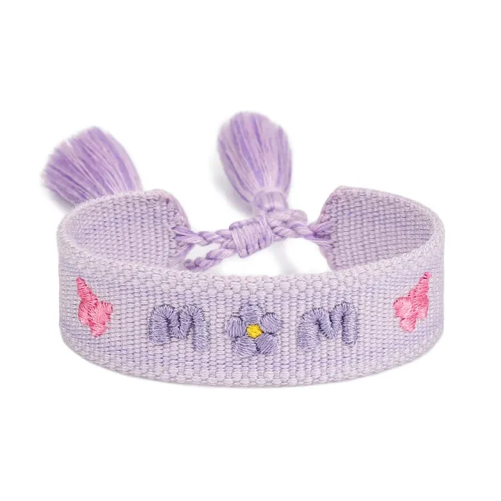 Actual ZM35-124 lavender embroidered MOM bracelet with a flower replacing the O, pink motifs and adjustable tassel ties