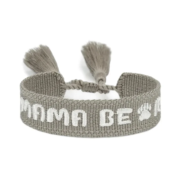 Actual gray ZM35-181 bracelet with white MAMA BEAR lettering and paw motifs